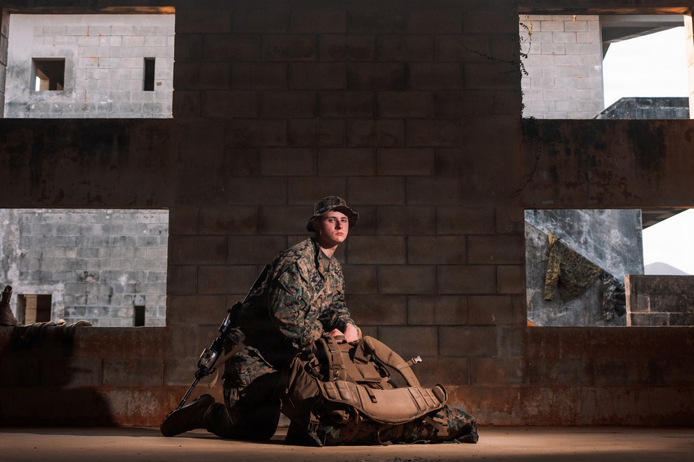 U.S. Marines conduct hike during communication strategy and operations field training exercise
