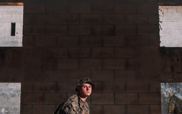 U.S. Marines conduct hike during communication strategy and operations field training exercise