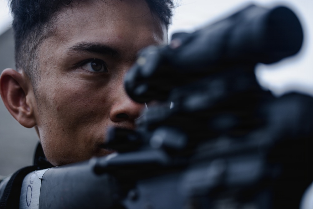 U.S. Marines conduct close quarters battle training during communication strategy and operations field training exercise