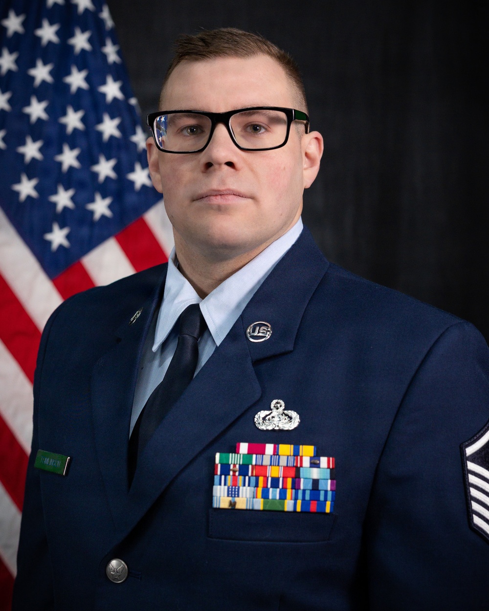 Tomlinson Biography Photo