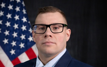 Tomlinson Biography Photo