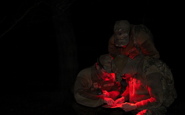 11th SFS Airmen compete during night land navigation