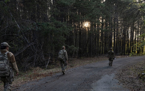 11th SFS Airmen compete during night land navigation
