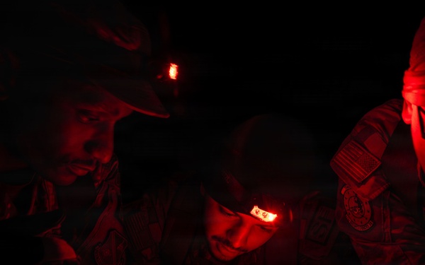 11th SFS Airmen compete during night land navigation