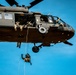 7th SFG (A) soldier rappels from a UH-60