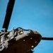 UH-60 hovers as soldiers from 7th SFG (A) and 6th RTB rappel