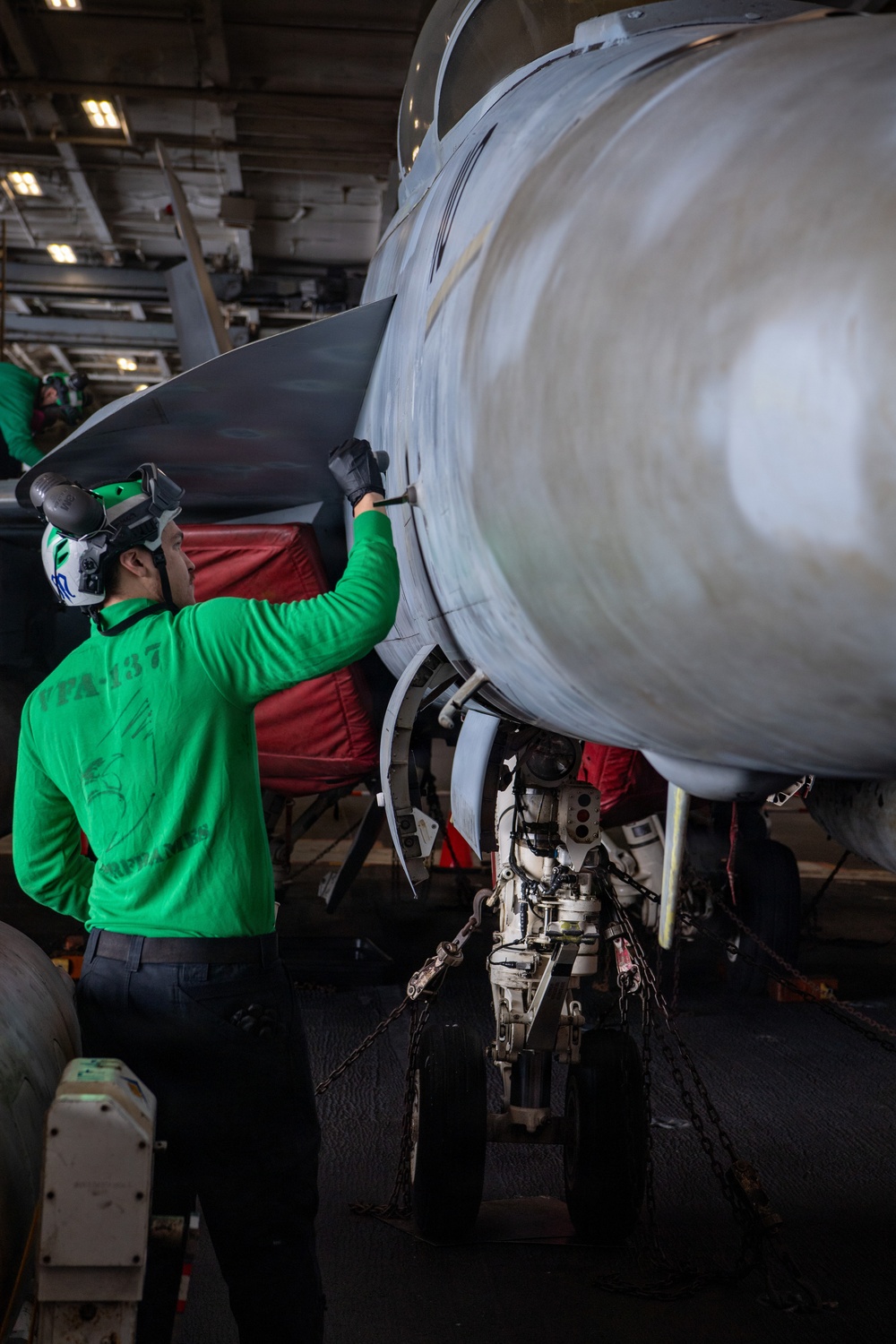 Sailor Conducts Maintenance