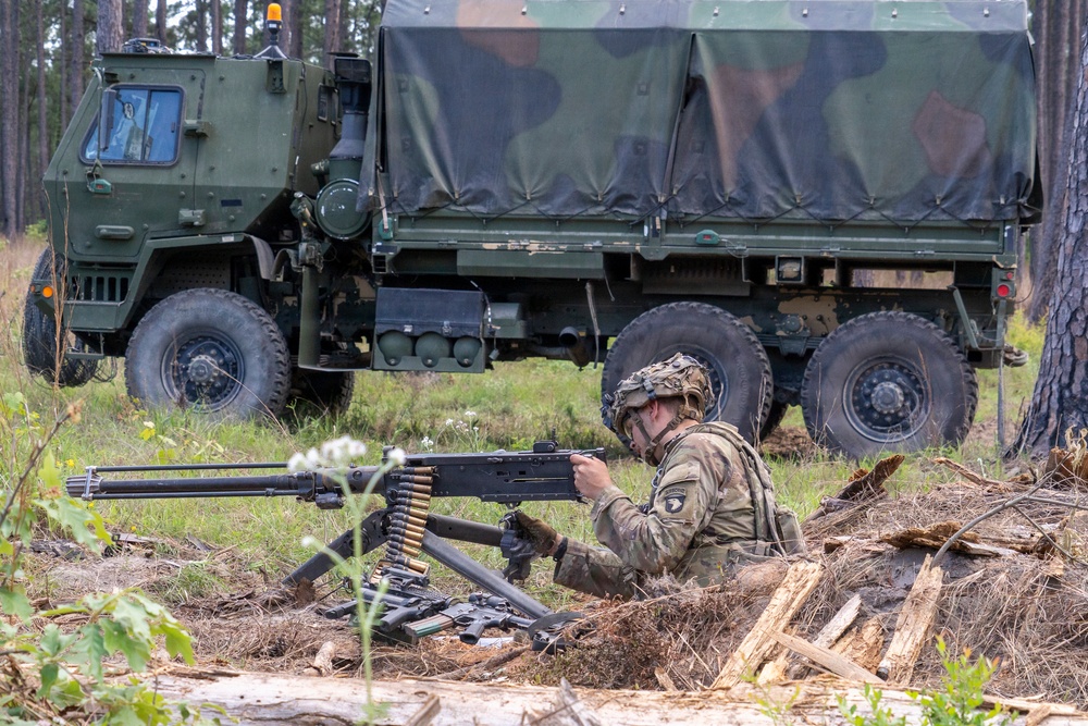 Rakkasan Soldier conducts weapons check from fortified fighting position at JRTC