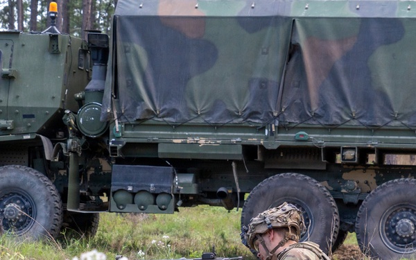 Rakkasan Soldier conducts weapons check from fortified fighting position at JRTC