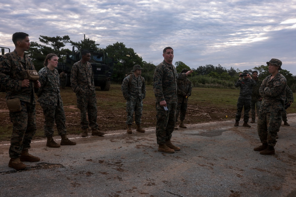 U.S. Marines conduct 12-kilometer hike and Marine Corps Martial Arts Program training during Communication Strategy and Operations Field Training Exercise