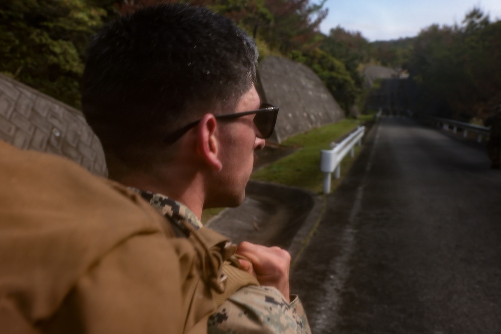 U.S. Marines conduct 12-kilometer hike and Marine Corps Martial Arts Program training during Communication Strategy and Operations Field Training Exercise