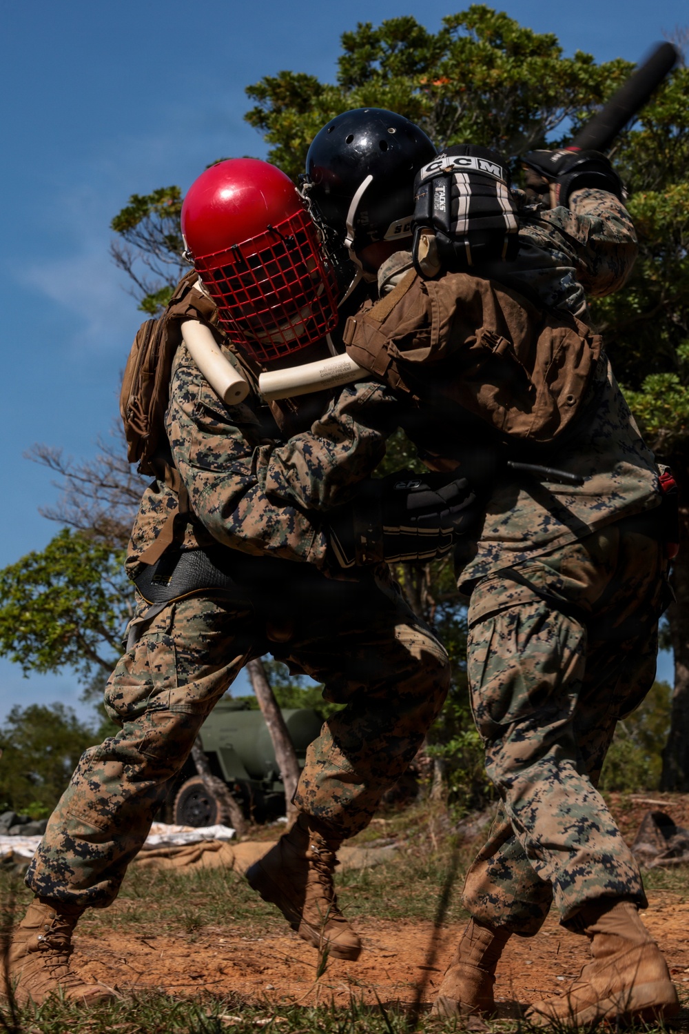 U.S. Marines conduct 12-kilometer hike and Marine Corps Martial Arts Program training during Communication Strategy and Operations Field Training Exercise