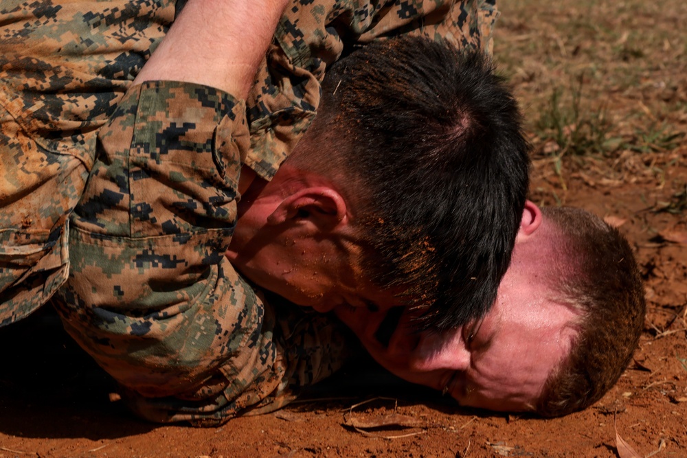 U.S. Marines conduct 12-kilometer hike and Marine Corps Martial Arts Program training during Communication Strategy and Operations Field Training Exercise