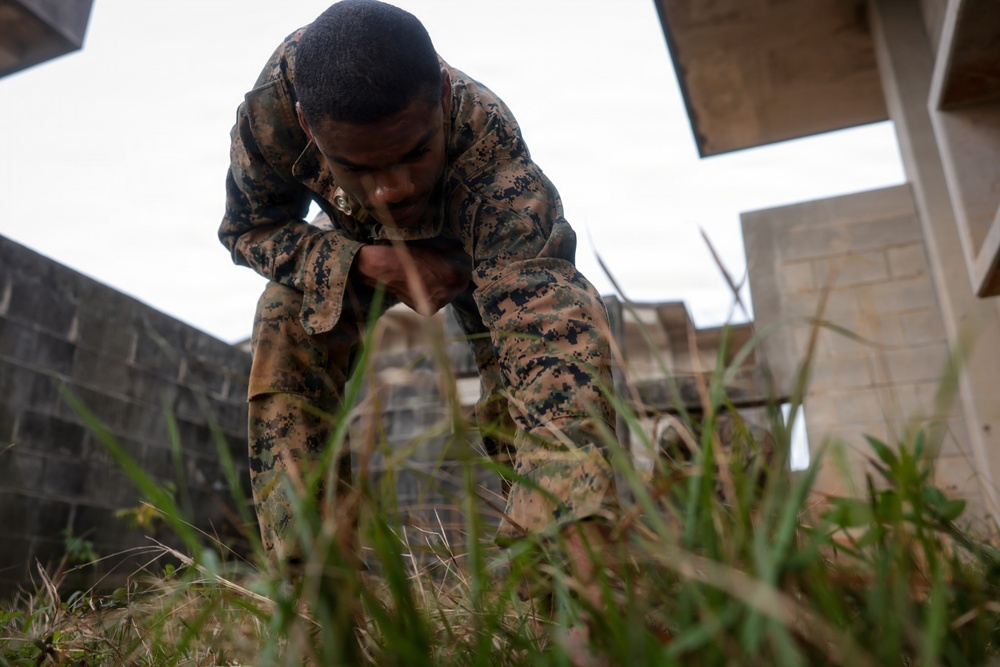 U.S. Marines conduct close quarters combat training during Communication Strategy and Operations Field Training Exercise