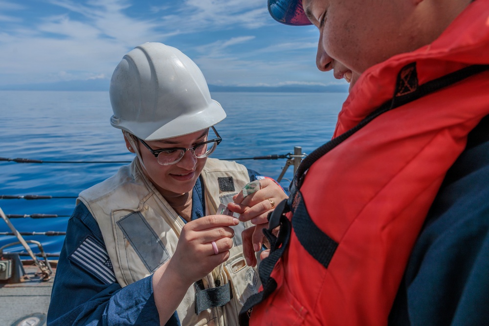 Hospital Corpsman aboard USS Gonzalez (DDG 66)