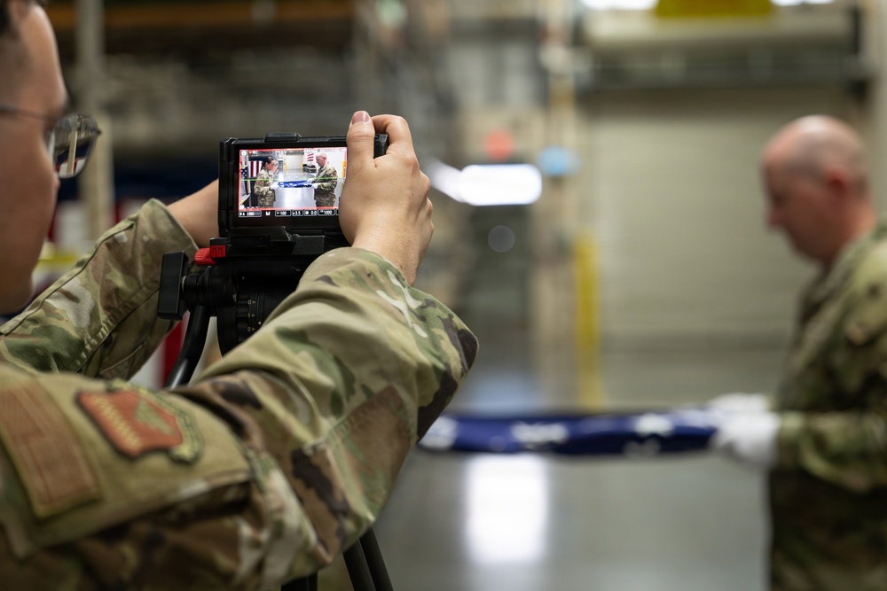 AFMAO Leaders Demonstrate Flag Folding for Training Video