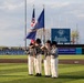 The USS Constitution Color Guard parades the colors at Legends Stadium