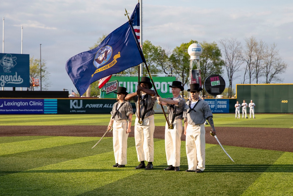 The USS Constitution Color Guard parades the colors at Legends Stadium