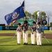 The USS Constitution Color Guard parades the colors at Legends Stadium