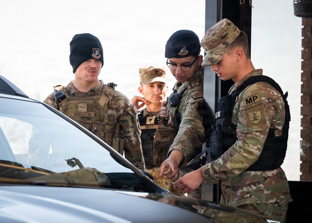 The 5th Security Forces Squadron exchanges job knowledge with the Army’s 816th Military Police Company during joint training