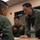 HMLA-369 holds pre-flight brief with Republic of Korea Marines
