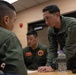 HMLA-369 holds pre-flight brief with Republic of Korea Marines