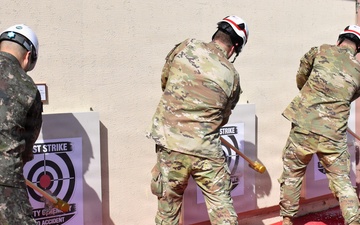 Sledgehammer swings mark start of Camp Walker emergency services project