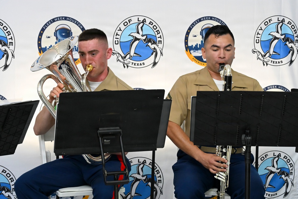 U.S. Marine Corps Band woodwind perform during the Parade of Ships VIP breakfast