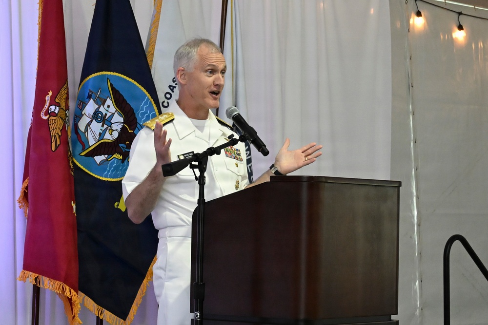 Vice Adm. Wayne Baze delivers remarks during the Parade of Ships VIP breakfast