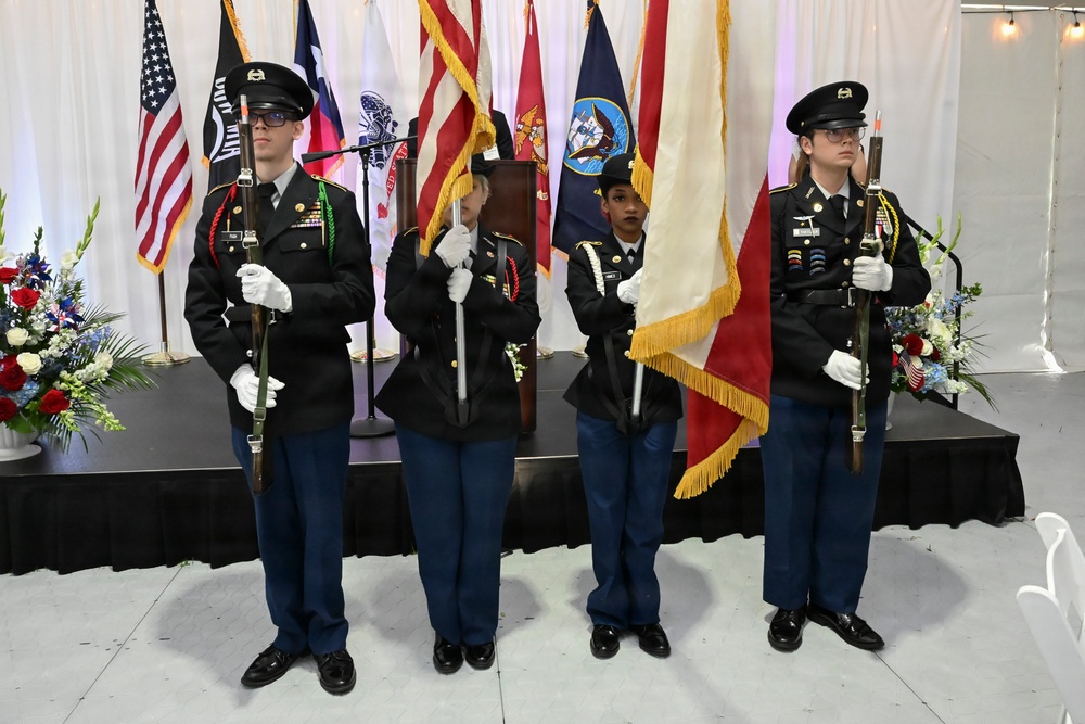 Junior ROTC color guard present the colors during the Parade of Ships VIP breakfast