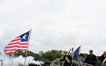 Ceremonial cannon salute is rendered as U.S. Navy ships transit the Houston Ship Channel during the Parade of Ships VIP breakfast