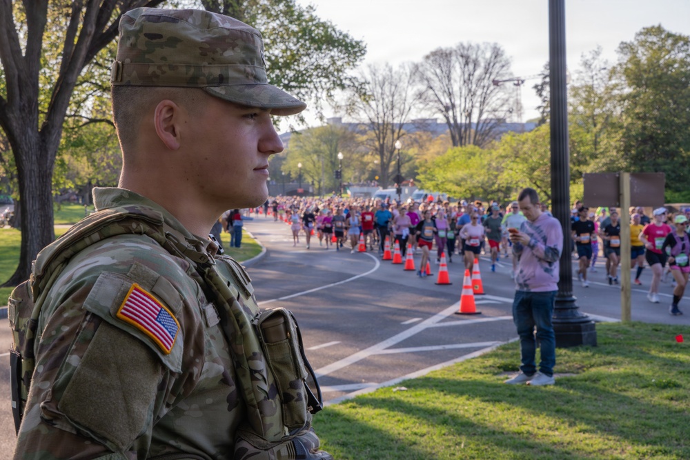 Mississippi National Guard Soldiers patrol at the Credit Union Cherry Blossom Ten Mile Run