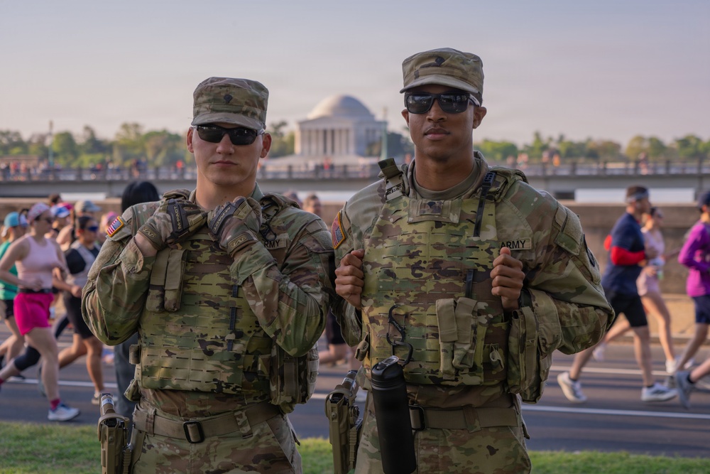 Mississippi National Guard Soldiers patrol at the Credit Union Cherry Blossom Ten Mile Run