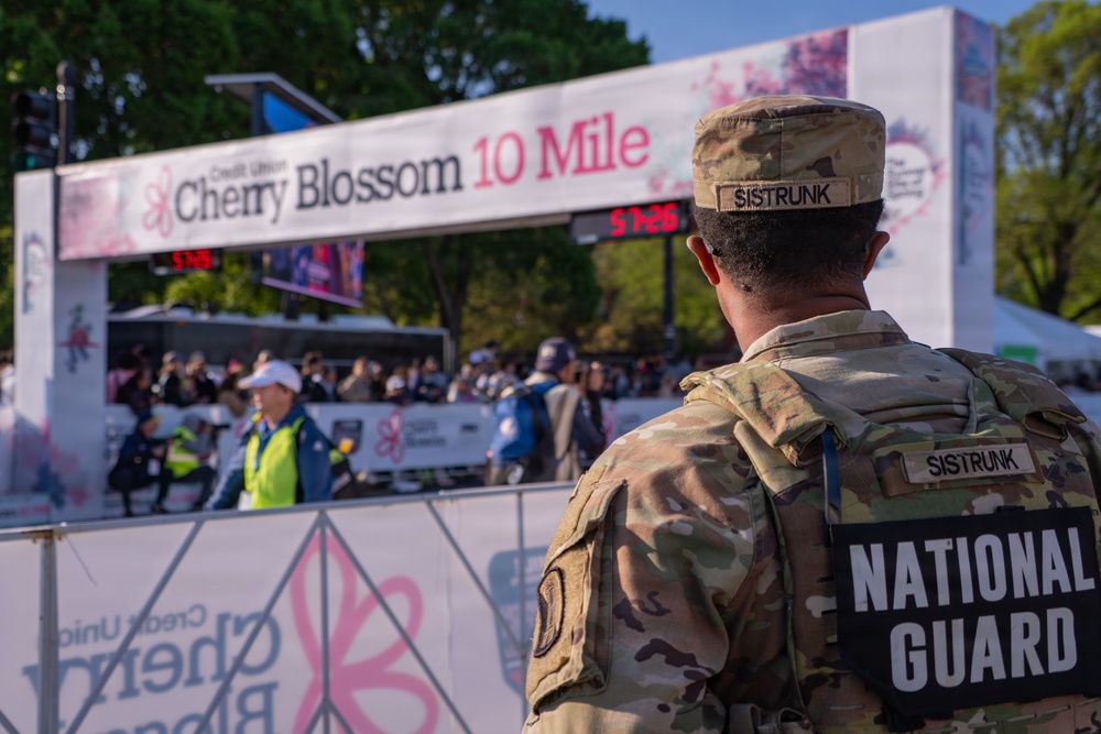 Mississippi National Guard Soldiers patrol at the Credit Union Cherry Blossom Ten Mile Run