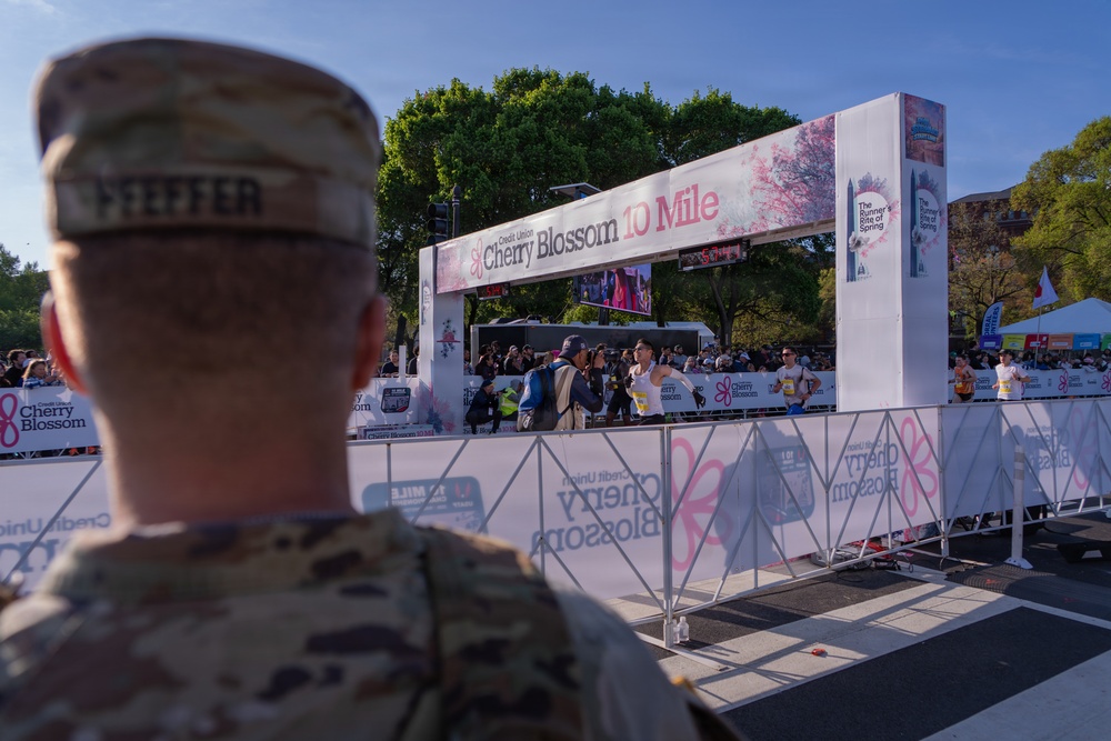 Mississippi National Guard Soldiers patrol at the Credit Union Cherry Blossom Ten Mile Run