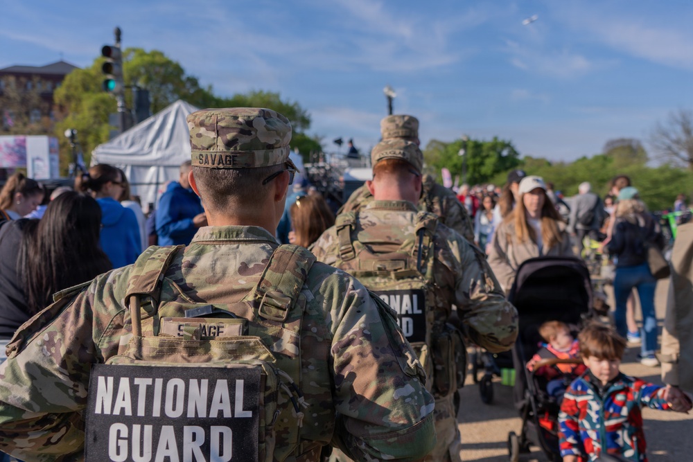 Mississippi National Guard Soldiers patrol at the Credit Union Cherry Blossom Ten Mile Run