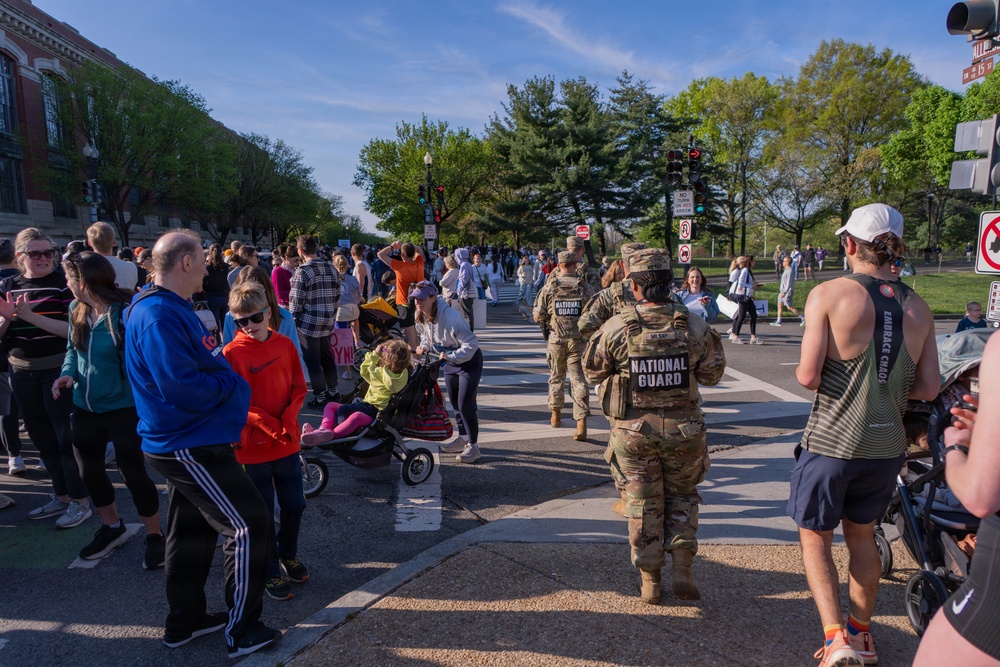 Mississippi National Guard Soldiers patrol at the Credit Union Cherry Blossom Ten Mile Run
