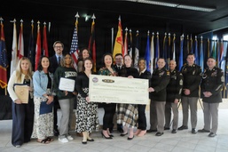 USAG Bavaria volunteer group photo with check