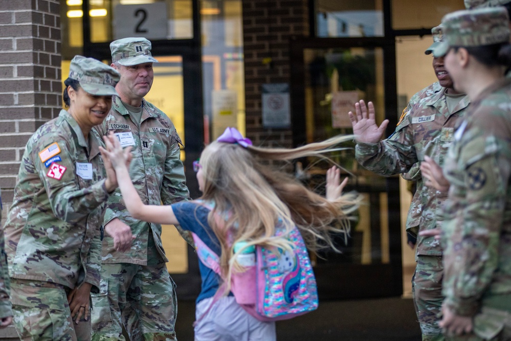 13th ACSC Soldiers support Purple Up Day at Lakewood Elementary School