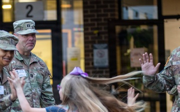 13th ACSC Soldiers support Purple Up Day at Lakewood Elementary School
