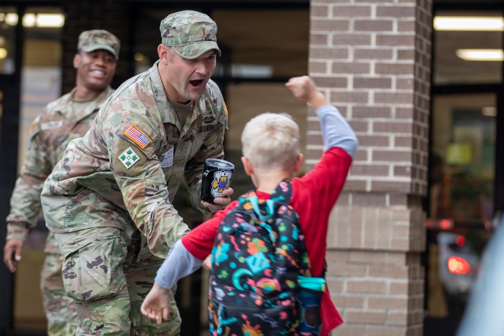 13th ACSC Soldiers Support Purple Up Day at Lakewood Elementary School