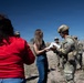 President and Director of Military and First Responders Programs Give Care Packages to JTF-SB Soldiers