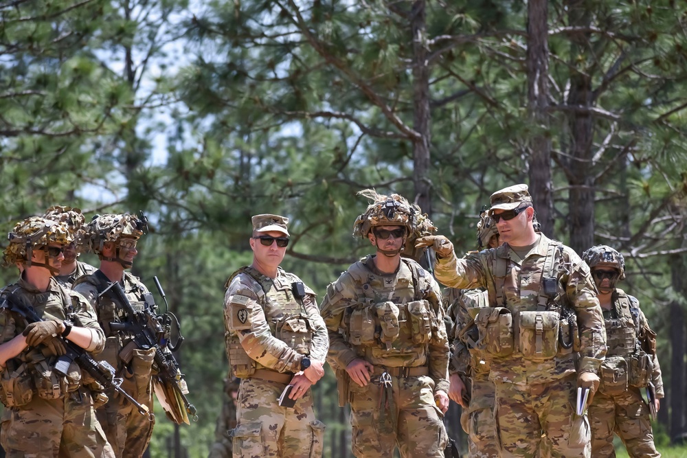 U.S. Army Col. Richard Bell, commander the of 3rd Mobile Brigade, 101st Airborne Division (Air Assault) discusses plans during C.A.R.