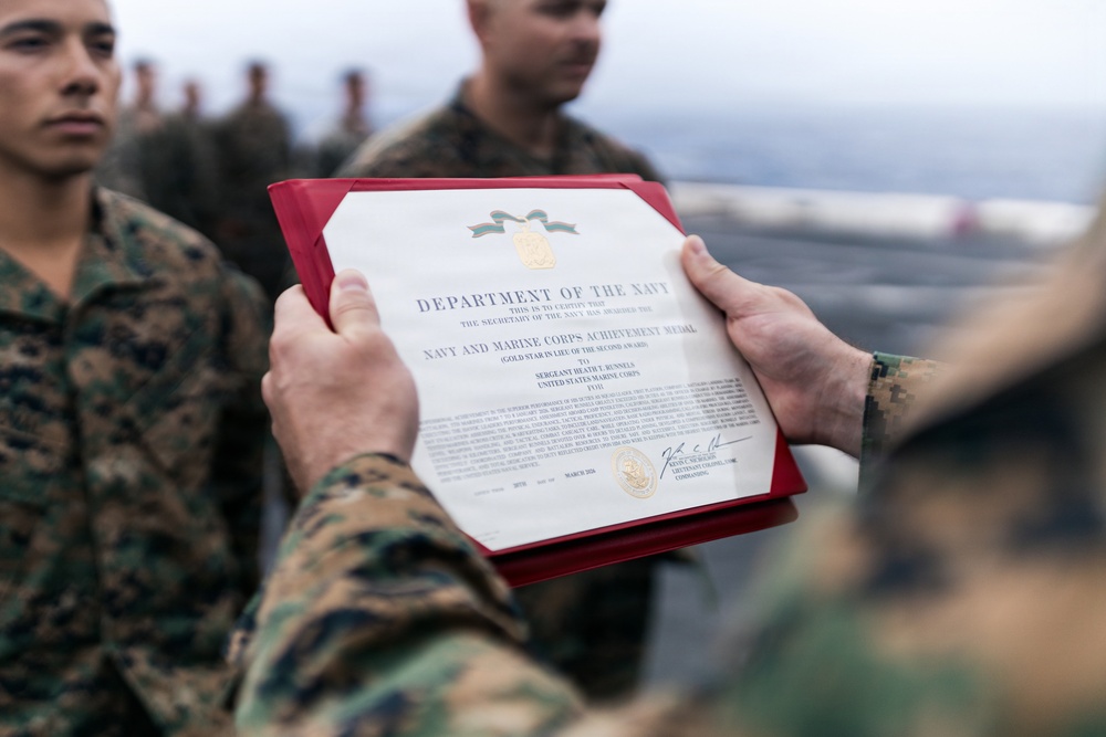11th MEU Marines Receive Navy and Marine Corps Achievement Medals Aboard USS Portland