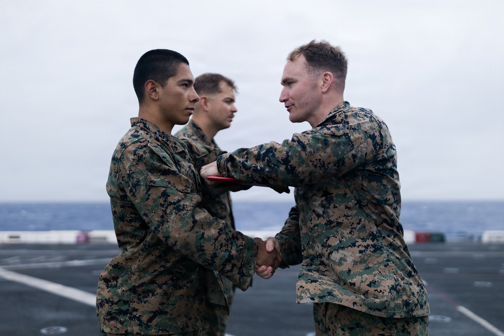 11th MEU Marines Receive Navy and Marine Corps Achievement Medals Aboard USS Portland