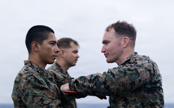 11th MEU Marines Receive Navy and Marine Corps Achievement Medals Aboard USS Portland