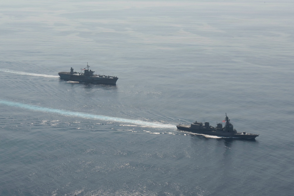 USS Blue Ridge (LCC 19) Steams Alongside Japan