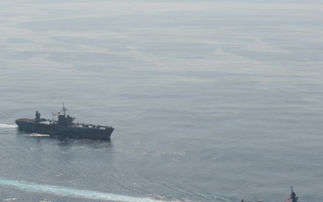 USS Blue Ridge (LCC 19) Steams Alongside Japan