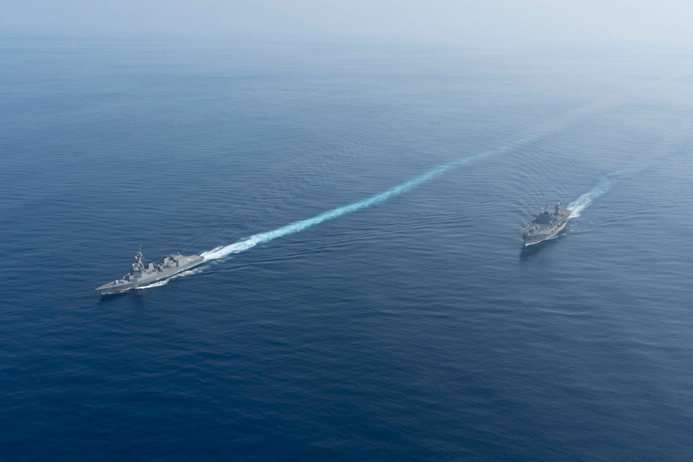 USS Blue Ridge (LCC 19) Steams Alongside Japan