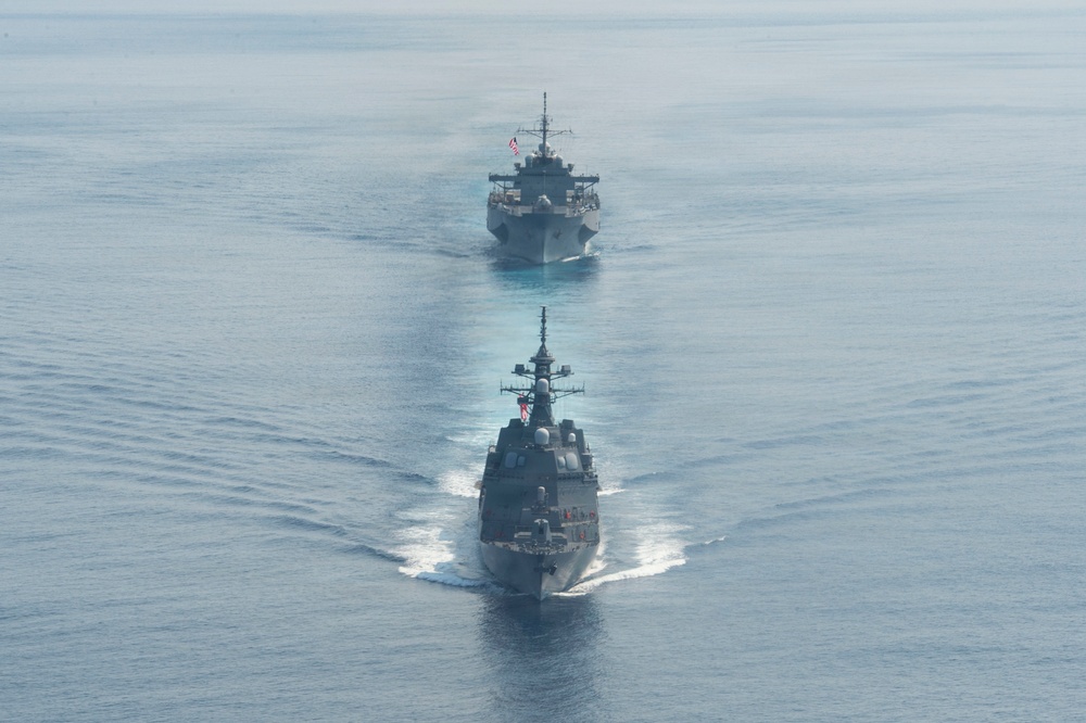 USS Blue Ridge (LCC 19) Steams Alongside Japan